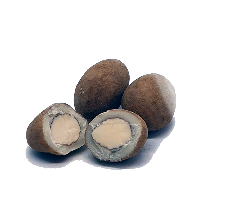 Kræmmerhus med mandler, overtrukket med hvid chokolade og lakridspulver